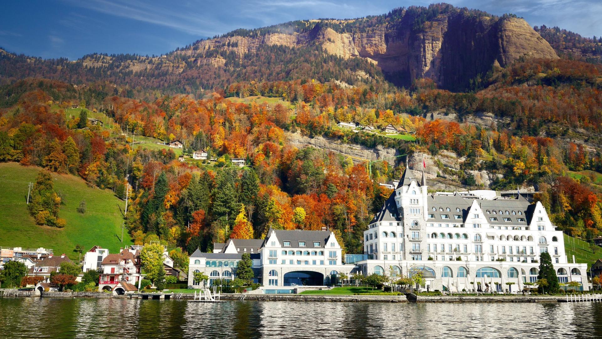 Swiss lakeside hotel with mountains and waterfront setting